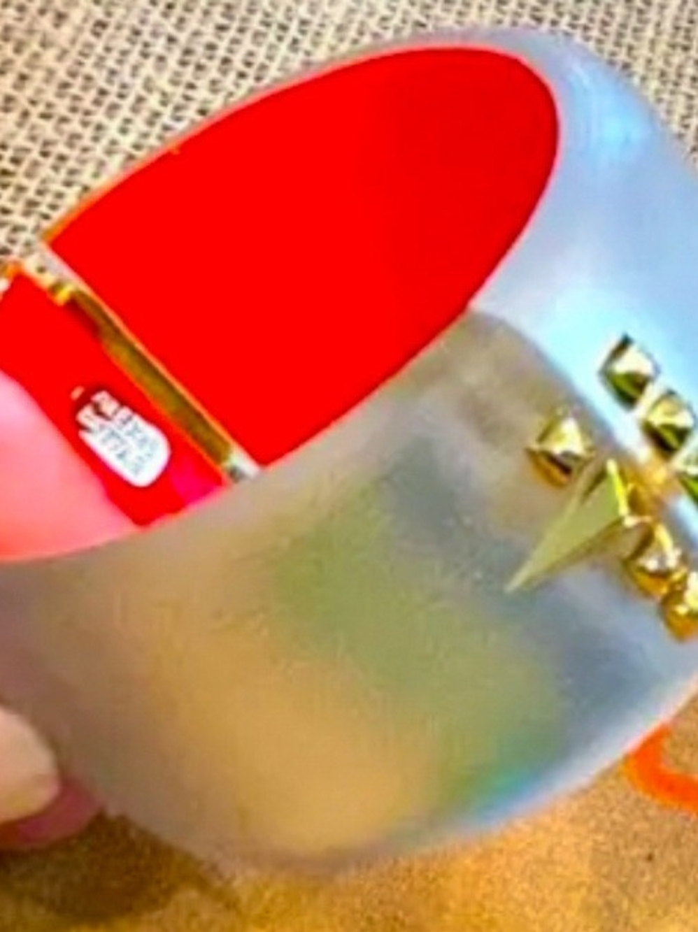 ALEXIS BITTAR BRACELET WITH ORANGE INSIDE AND SILVER TONES ON OUTSIDE OF CUFF !